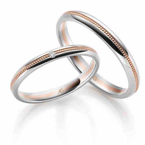 Trauringe Weissgold-Rotgold 1 Brillant 0.01 ct.