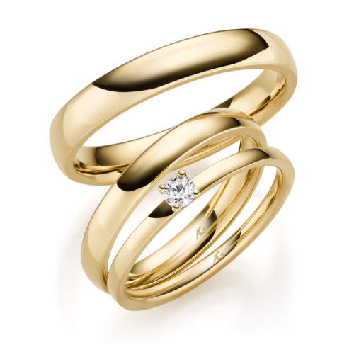 Klassische Trauringe und Solitärring